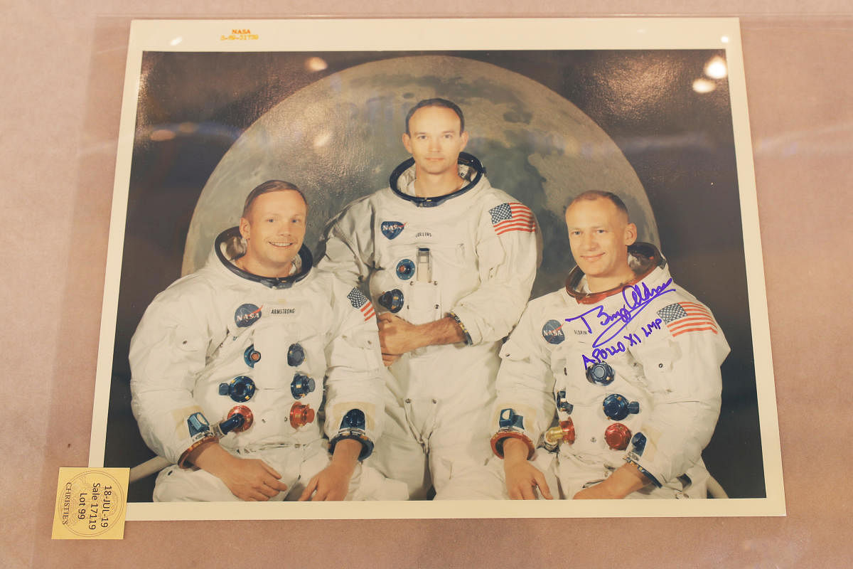 A signed photograph of the Apollo 11 astronauts is displayed as part of Christie's upcoming "One Giant Leap: Celebrating Space Exploration 50 Years After Apollo 11" auction in New York, U.S., July 10, 2019. REUTERS/Lucas Jackson
