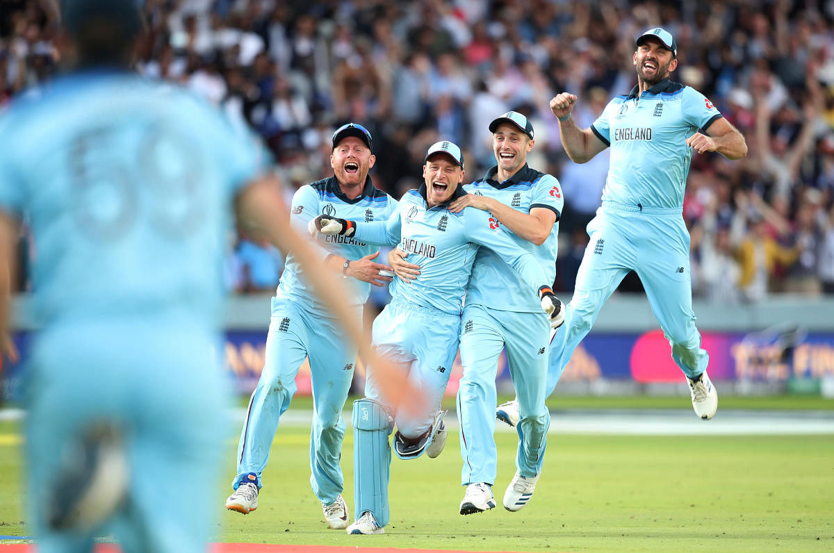 England's Jonny Bairstow, Jos Buttler, Chris Woakes and Liam Plunkett celebrate winning the World Cup after the super over. Reuters