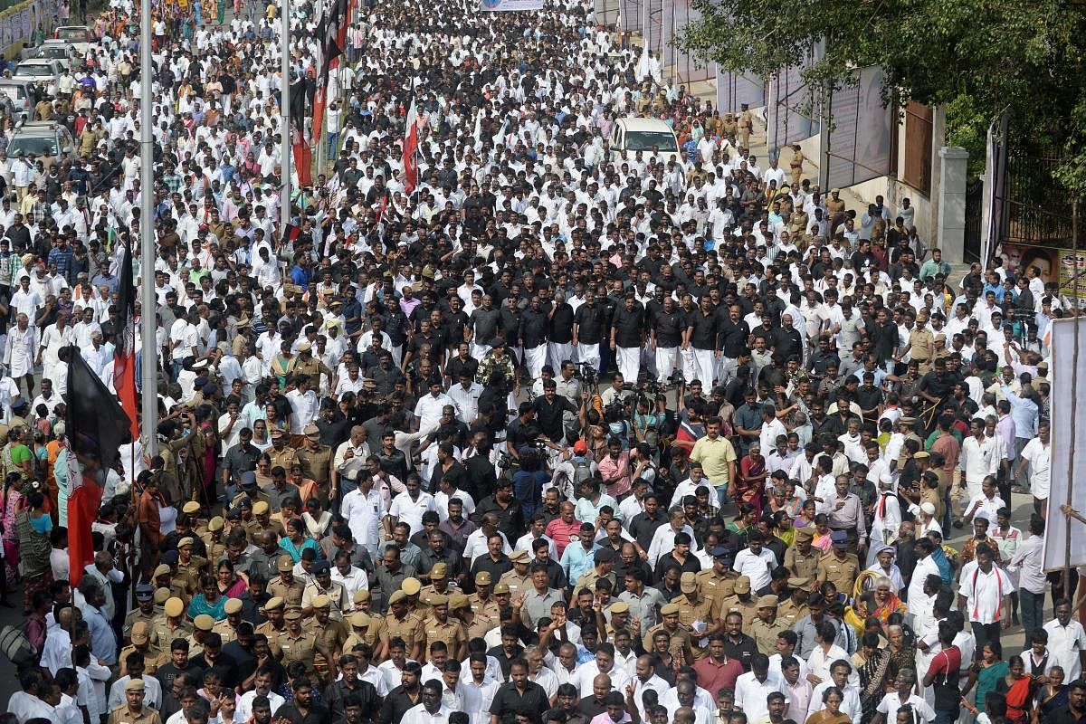 Supporters of the All India Anna Dravida Munnetra Kazhagam (AIADMK) party take part in a procession at the memorial of former Tamil Nadu chief minister Jayalalitha in 2017 (AFP File Photo)