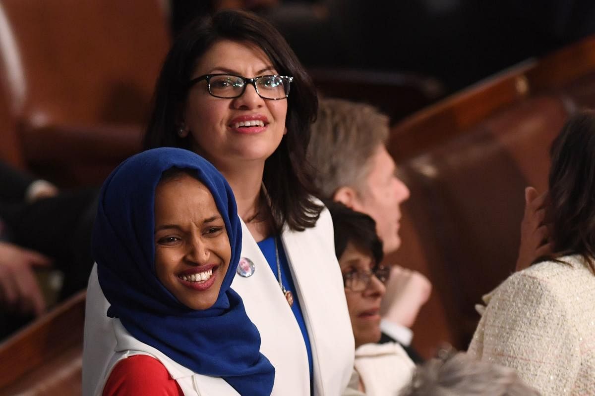 In this file photo taken on February 5, 2019 US Representative Ilhan Omar (D-MN) (L) and US Representative from Michigan Rashida Tlaib (D-MI), arrive for the State of the Union address at the US Capitol in Washington, DC. AFP
