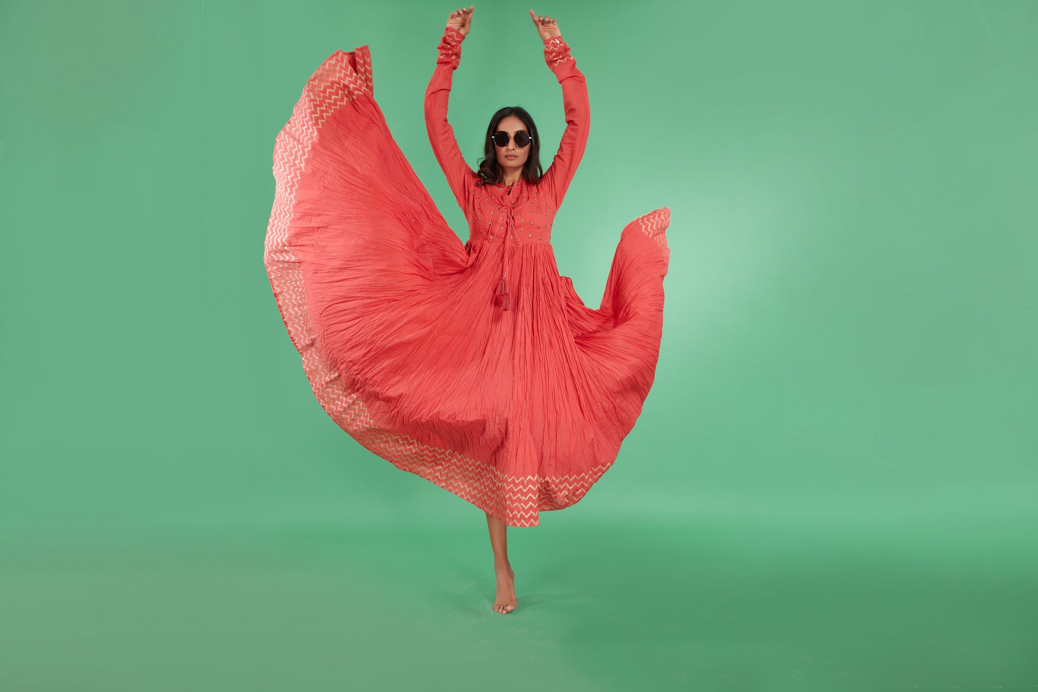 Pantone’s colour of the year, ‘living coral’, is a vibrant yet mellow color, which is the perfect way to go dressy without catching everyone’s eyes.