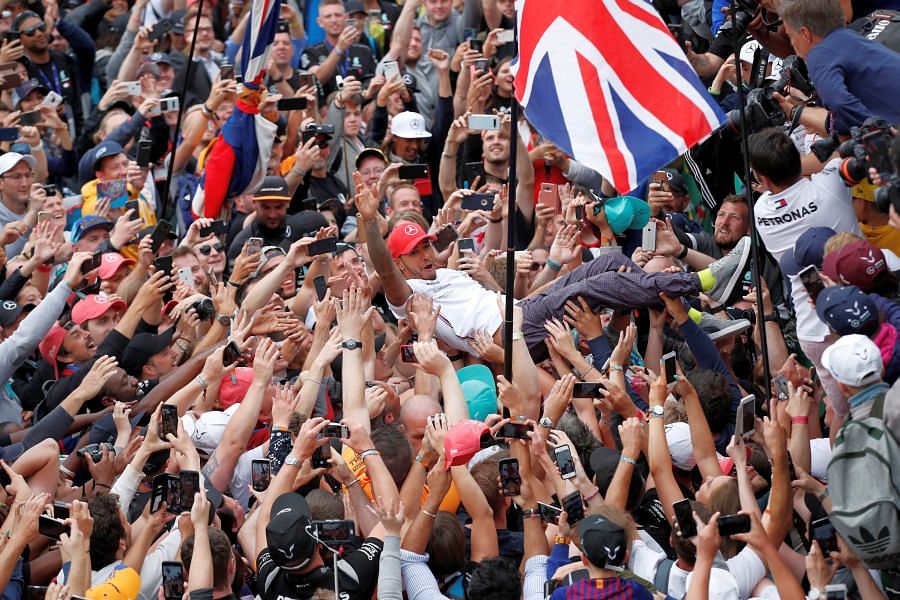 Lewis Hamilton is a happy man after bagging the most British GP wins. Picture credit: Reuters