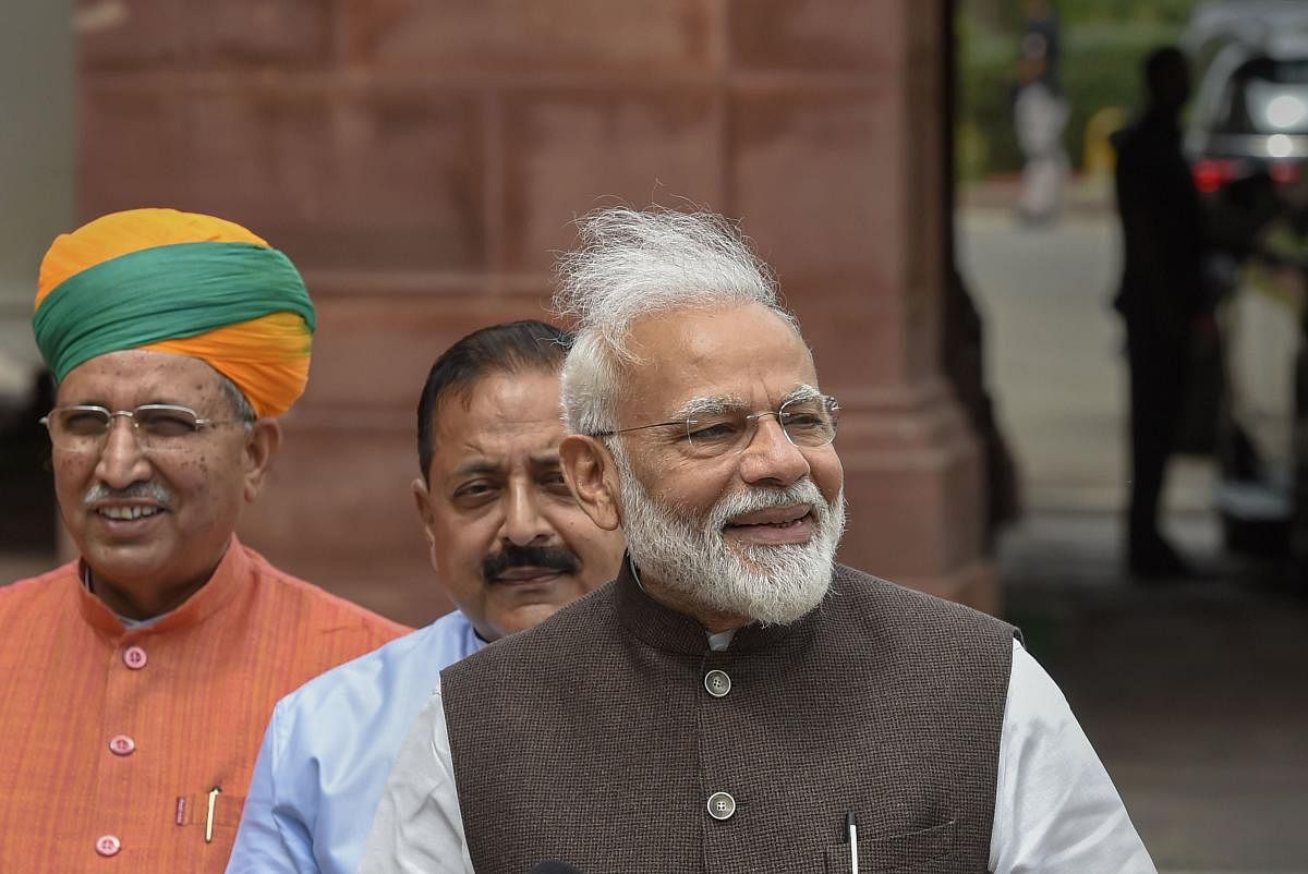 Prime Minister Narendra Modi Tuesday asked BJP MPs to nurse their constituency by playing a leading role in its development and advised them to take up a cause of human sensitivity like eradication of leprosy or tuberculosis (PTI Photo)