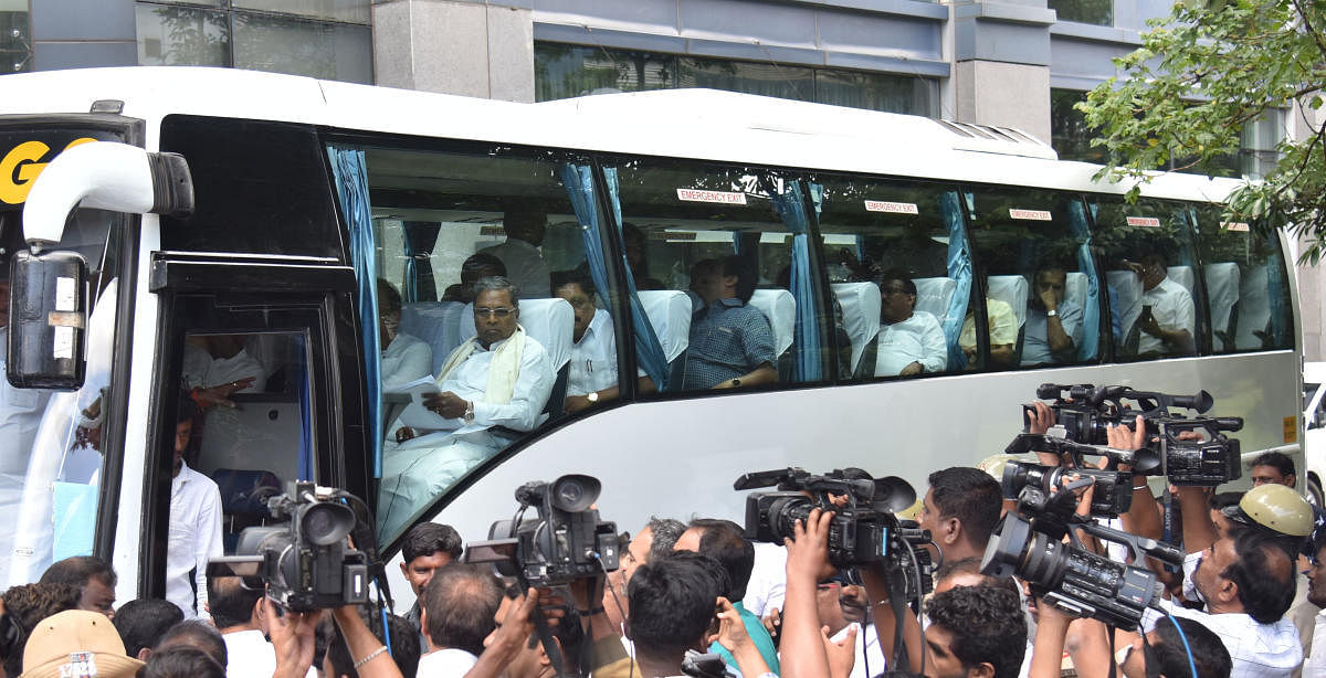 Congress legislators, led by CLP leader Siddaramaiah, leave Vivanta by Taj after the CLP meeting on Monday.