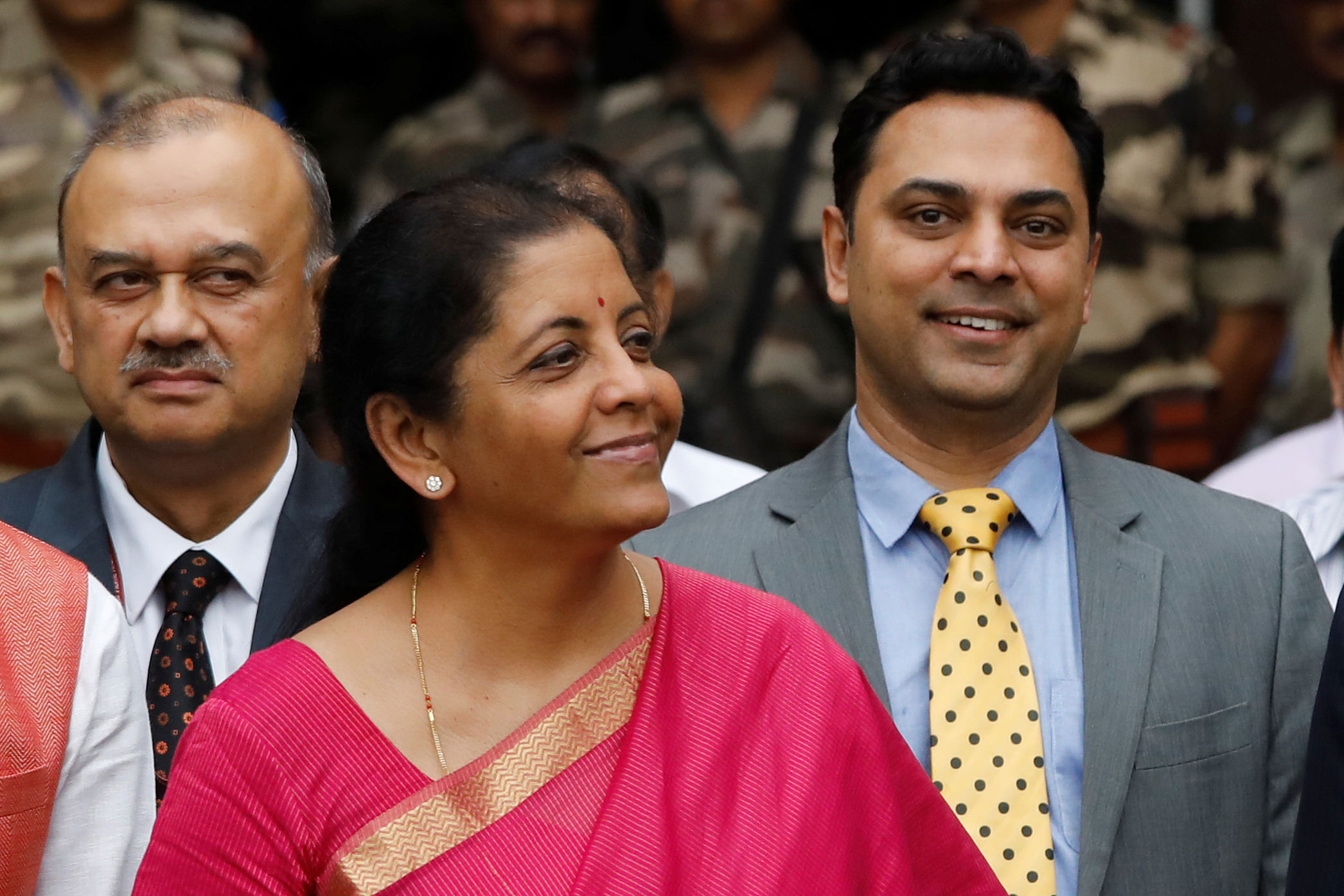 ndia's Finance Minister Nirmala Sitharaman (C) and Krishnamurthy Subramanian (R), chief economic adviser Krishnamurthy Subramanian. (Reuters Photo)