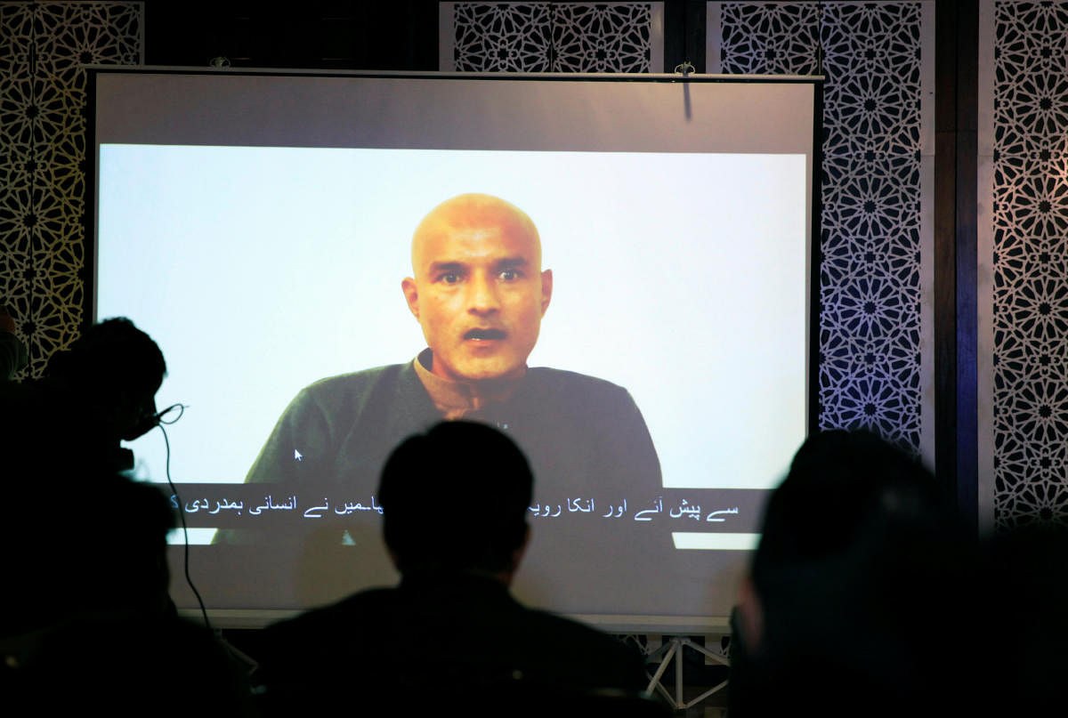 Kulbhushan Jadhav is seen on a screen during a news conference at the Ministry of Foreign Affairs in Islamabad, Pakistan. (Reuters File Photo)