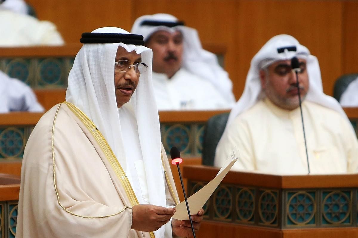 Kuwaiti Prime Minister Sheikh Jaber al-Mubarak al-Sabah (L) delivers a speech during a parliament session at Kuwait's national assembly, in Kuwait City. (AFP Photo)