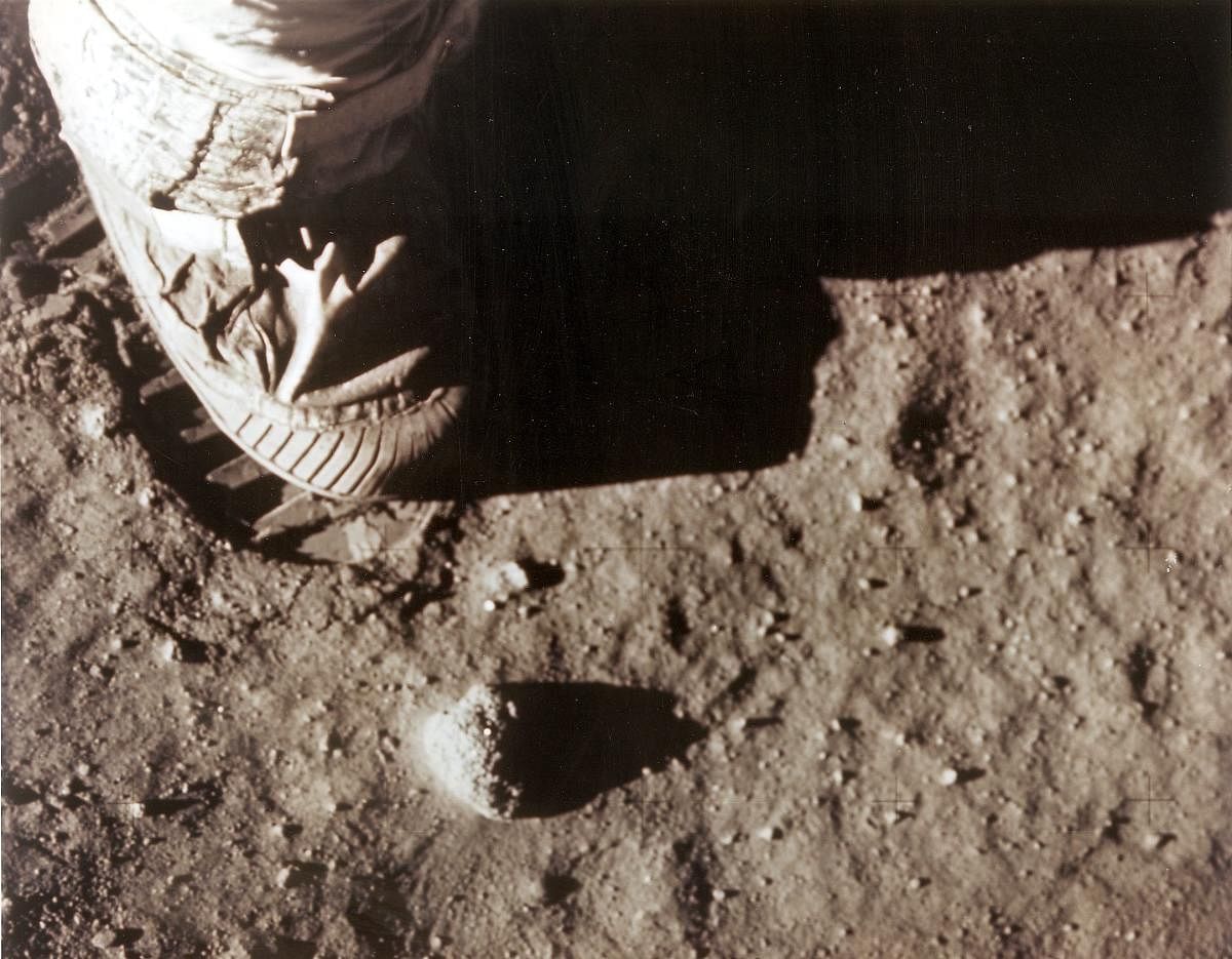 In this NASA file photo taken on July 20, 1969 Apollo 11 commander Neil Armstrong's right foot leaves a footprint in the lunar soil.Photo credit: AFP