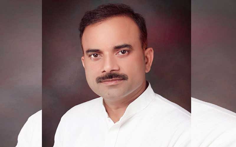 BJP legislator Sushil Singh, who was considered to be a 'muscleman' in the area, barged into a high school in Sayyadraja area in the district a few days back while the classes were going on there and got the students of 10th and 12th standards to fill the BJP membership forms. (Facebook)