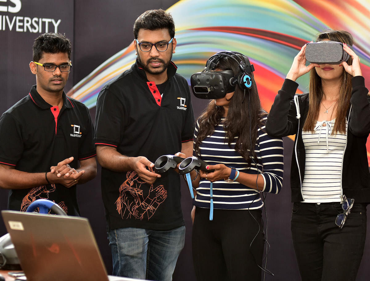 Students use Google Cardboards at the launch of Academic AR/VR Centre of Excellence on Tuesday. DH photo/Ranju p