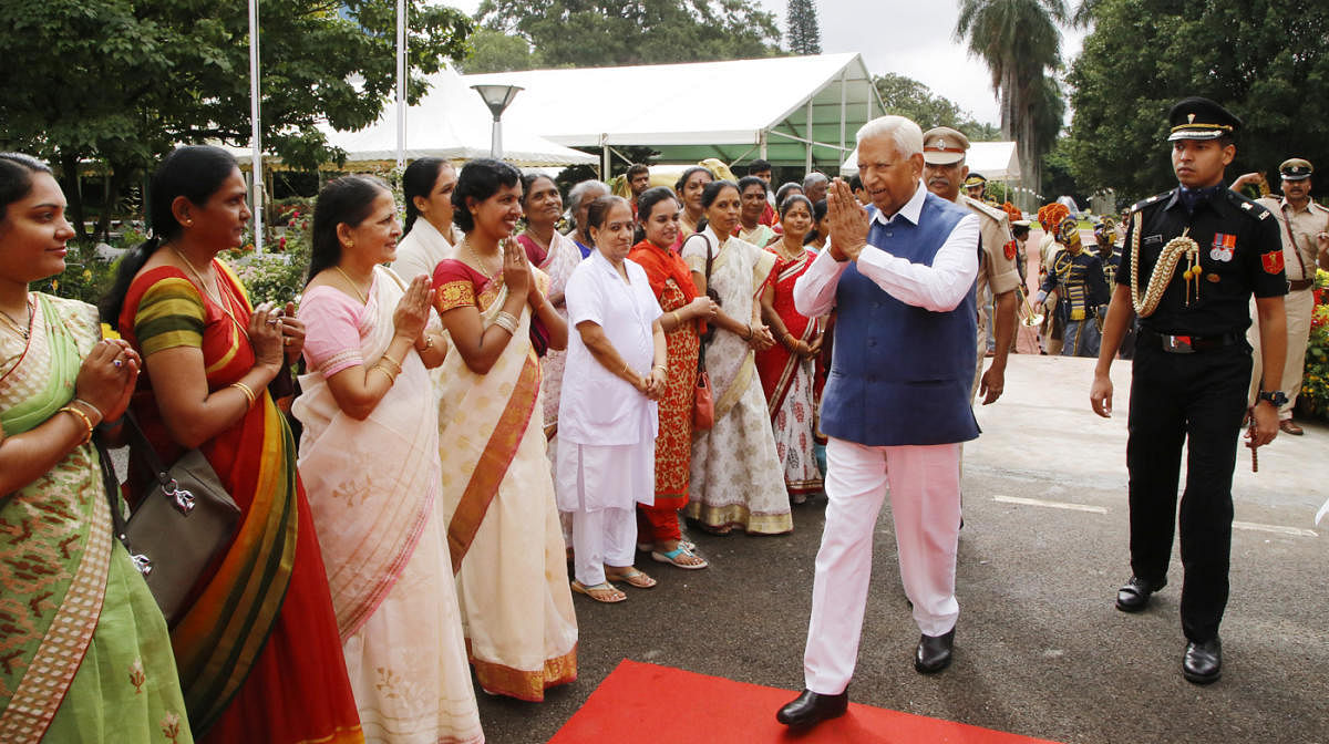 Governor Vajubhai Vala greets the staff of Raj Bhavan on Independence Day.