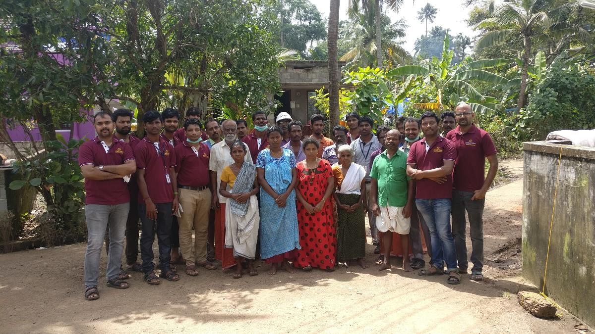 The team at Ollur village in Kerala after ligting up 150 homes