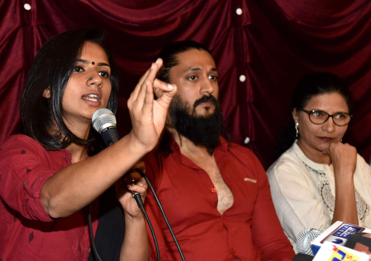 Actress Sruthi Hariharan with actor Chetan and filmmaker Kavitha Lankesh at a press conference on Saturday. DH PHOTO/MANJUNATH M S