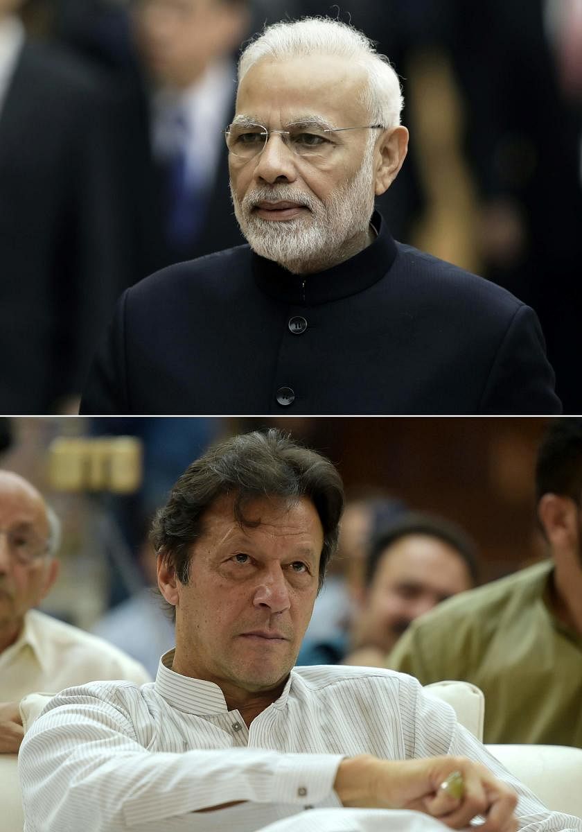 A combination of file pictures of Prime Minister Narendra Modi and Pakistan Prime Minister Imran Khan. AFP