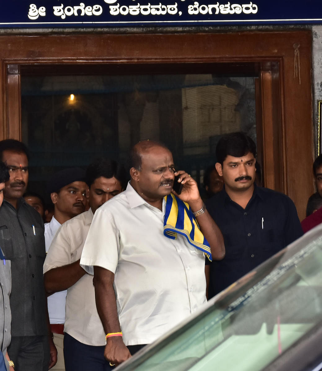 Chief Minister H D Kumaraswamy comes out of the Sringeri Shankar Mutt after offering prayers with his family in Bengaluru on Wednesday. DH Photo/Krishnakumar P S