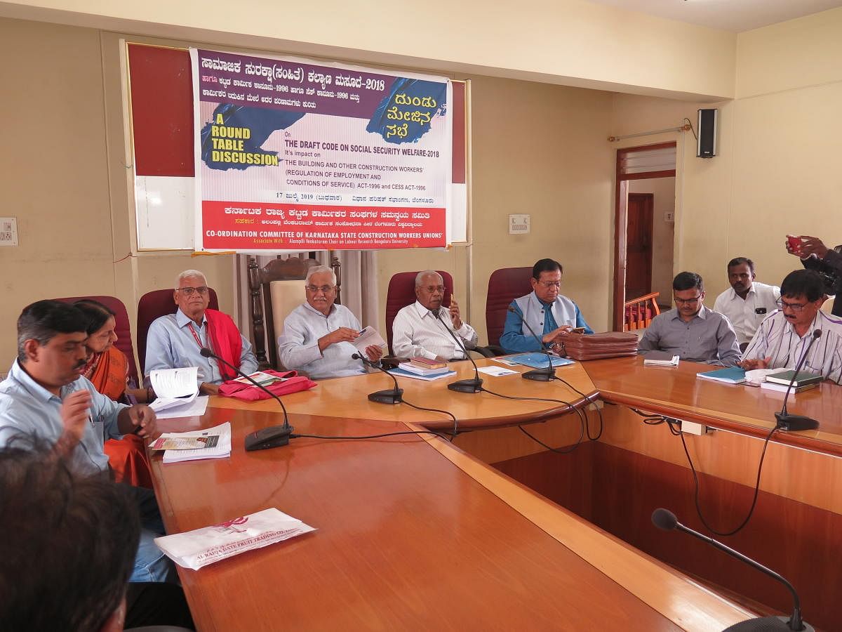 Trade unionists, activists and former officials discus the centre's new draft code on Social Security Welfare (2018) at the Legislator's Home (Council) in Bengaluru on July 17, 2019.From left: Mahantesh (secretary, CITU), Kathyayini Chamaraj (social acti