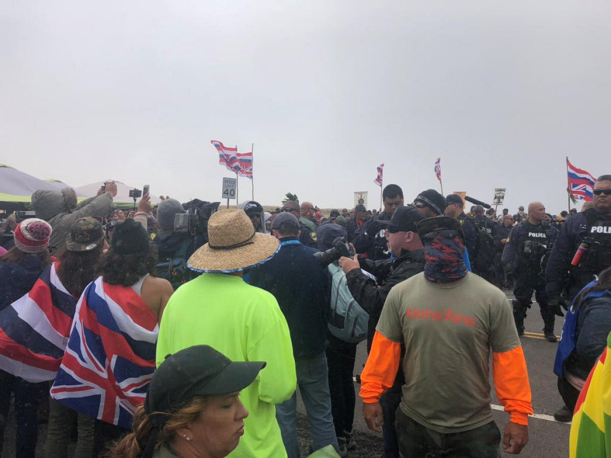 Protesters led by native Hawaiian elders take part in a protest against the building of a giant new telescope on what they considered sacred ground at the summit of Mauna Kea volcano, on Big Island, Hawaii. Ryan Finnerty/Hawaii Public Radio via Reuters