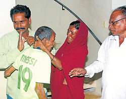 Daulats wife breaks down when she saw her husband, who went missing five months ago, in Mangalore on Saturday. Daulat, picked up from one of the streets in Mangalore, was sheltered in White Doves, a home for destitutes.