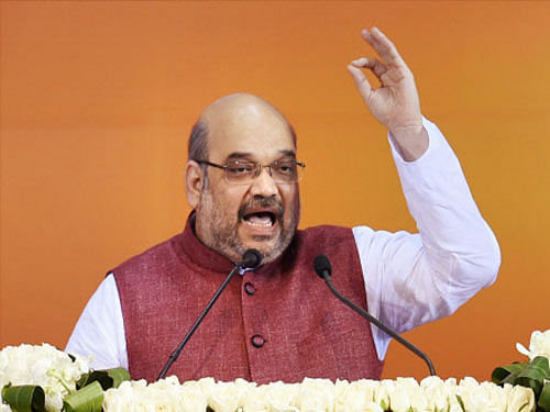BJP president Amit Shah Thursday gave a clarion call to 'uproot the scam-ridden Congress-NCP' government in Maharashtra to ensure the state's return to pride and progress. PTI file photo