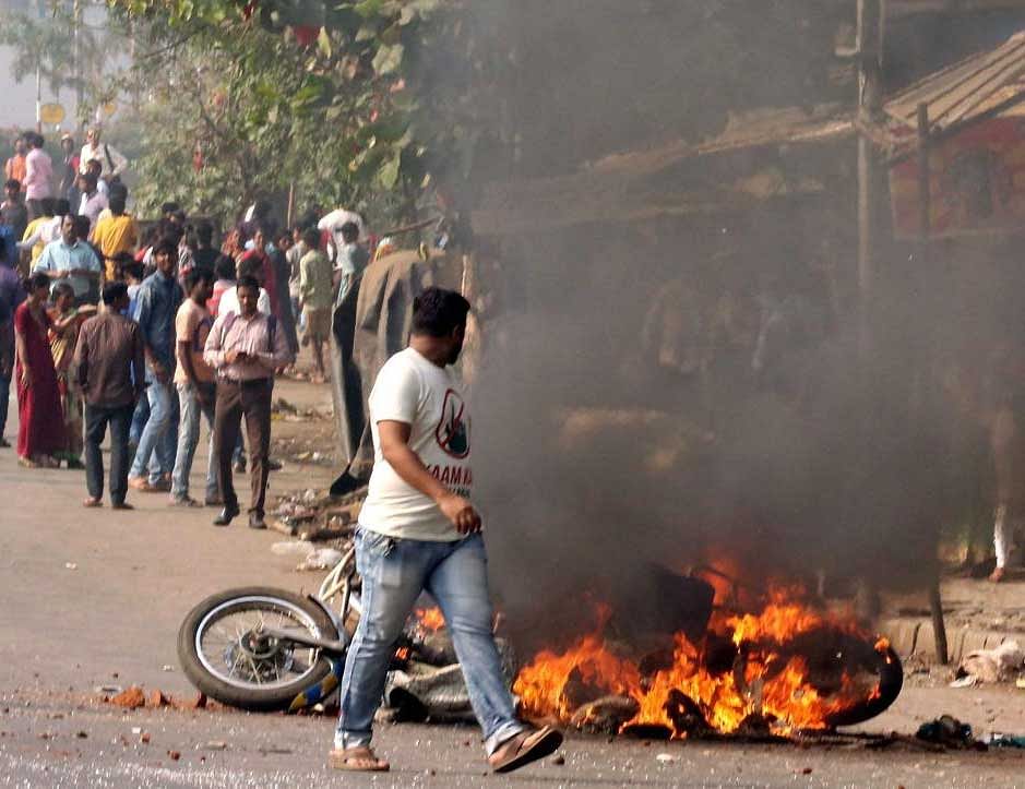 A student was killed in the violence and arson that rocked Maharashtra during the bandh on Wednesday that brought Mumbai to its knees. PTI file photo