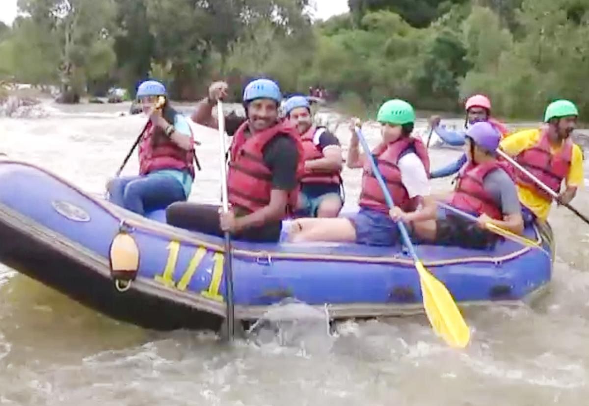 Tourists go rafting in River Cauvery at Dubare.