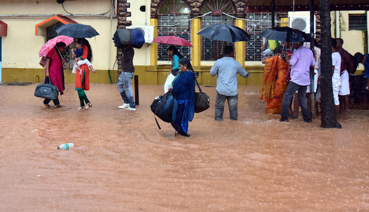 Passengers seen wading in ankle-deep water after Mangaluru Central railway station witnessed unprecedented water-logging on Thursday.