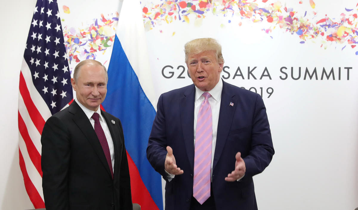 Vladimir Putin and Donald Trump attend a meeting on the sidelines of the G20 summit in Osaka, Japan (Reuters File Photo)