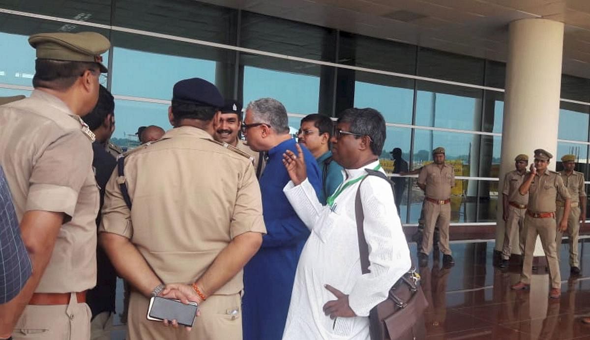 Derek O'Brien led TMC delegation protest after they were stopped by police at the airport, while on their way to meet family members of victims killed in clashes over a land dispute in Sonbhadra (PTI Photo)