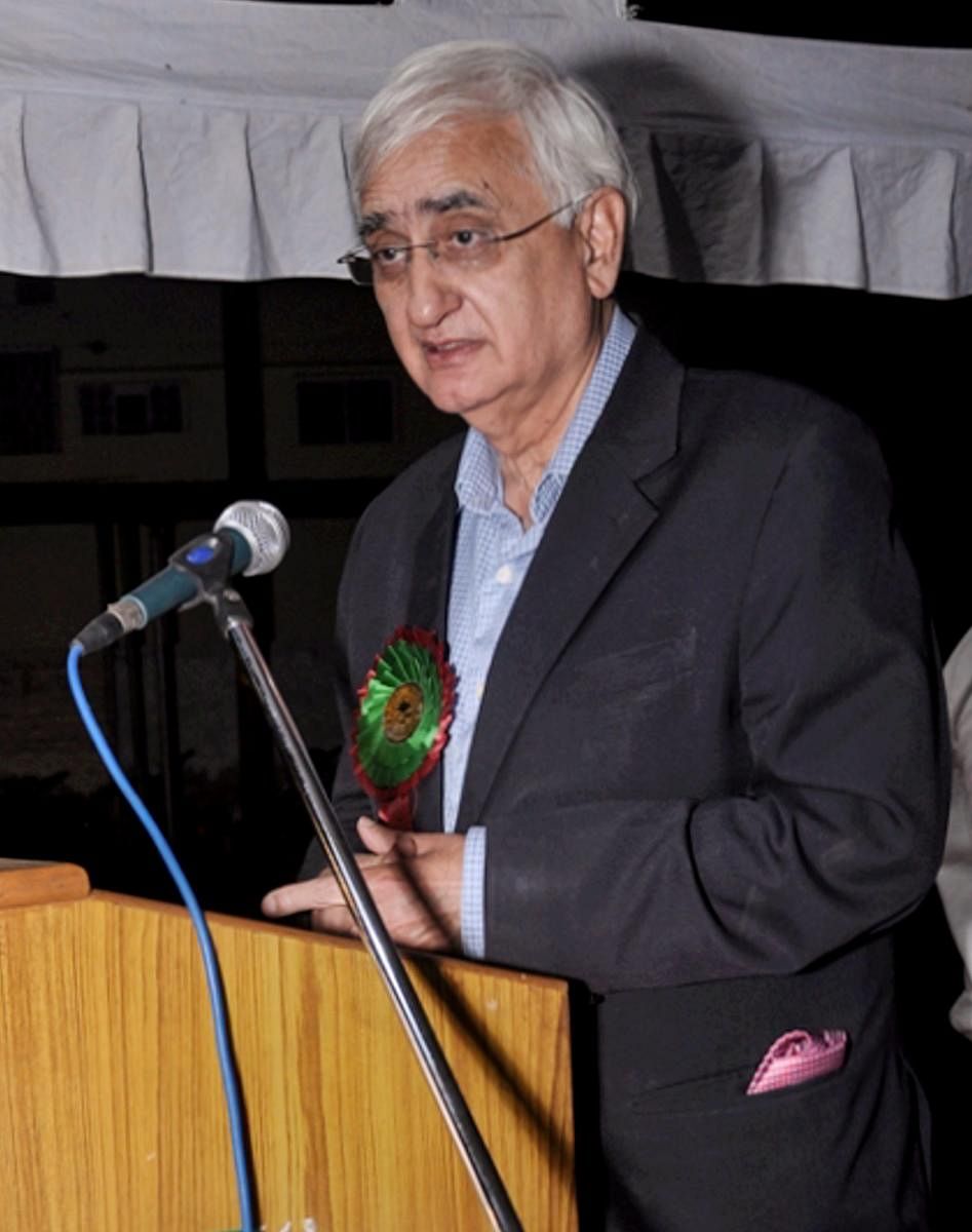 Aligarh: Former Union minister Salman Khurshid addresses a function in Aligarh Muslim University on Sunday. Khurshid has said there are Muslims' blood stains on the Congress hands. PTI Photo (PTI4_24_2018_000174B)