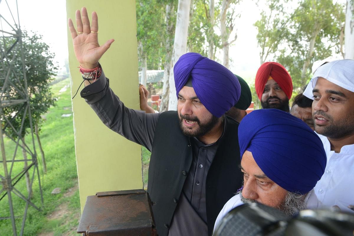 Sidhu, who has been avoiding the media for more than a month now, once again dodged questions posed by reporters as he vacated the premises here. (AFP File Photo)