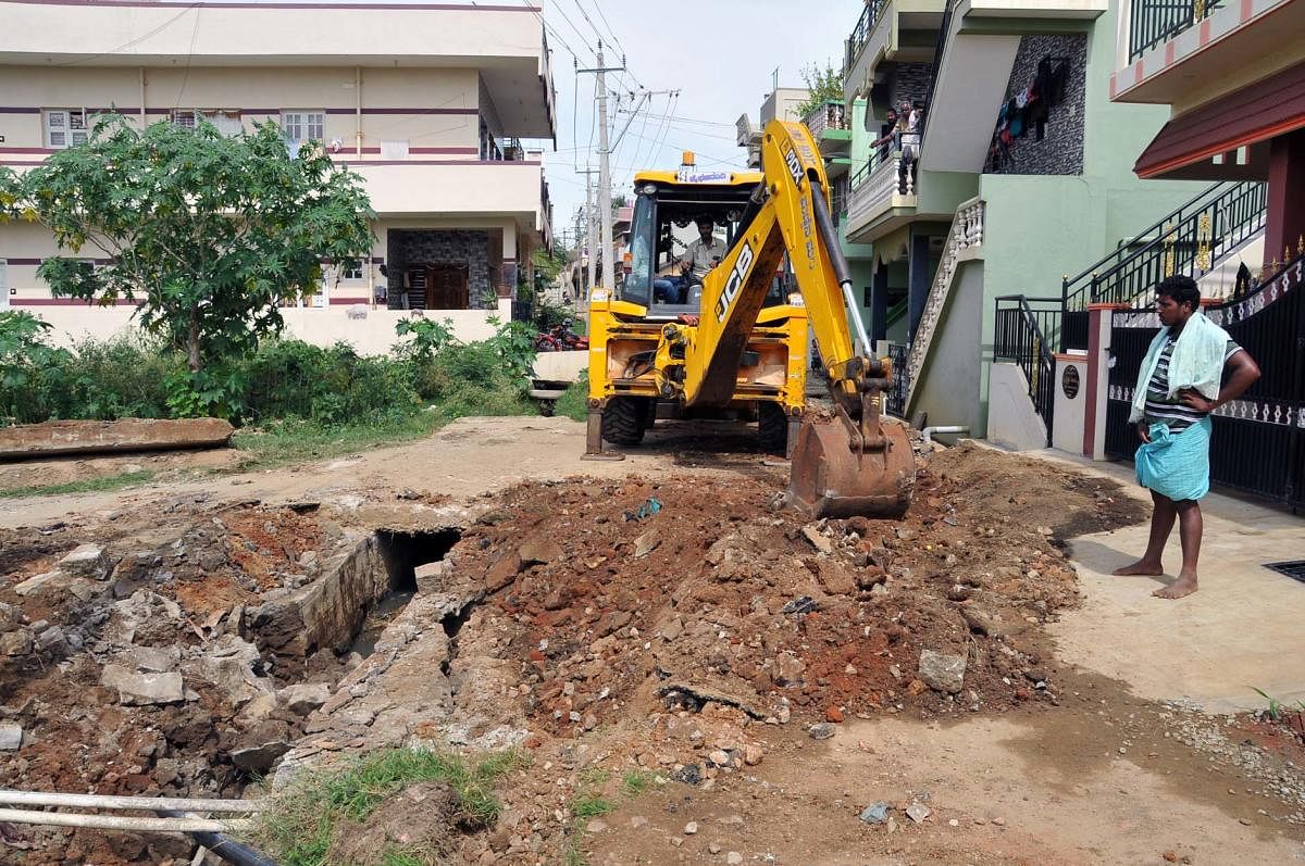 The incomplete work on underground drainage at Gandhinagar in Chikkamagaluru.