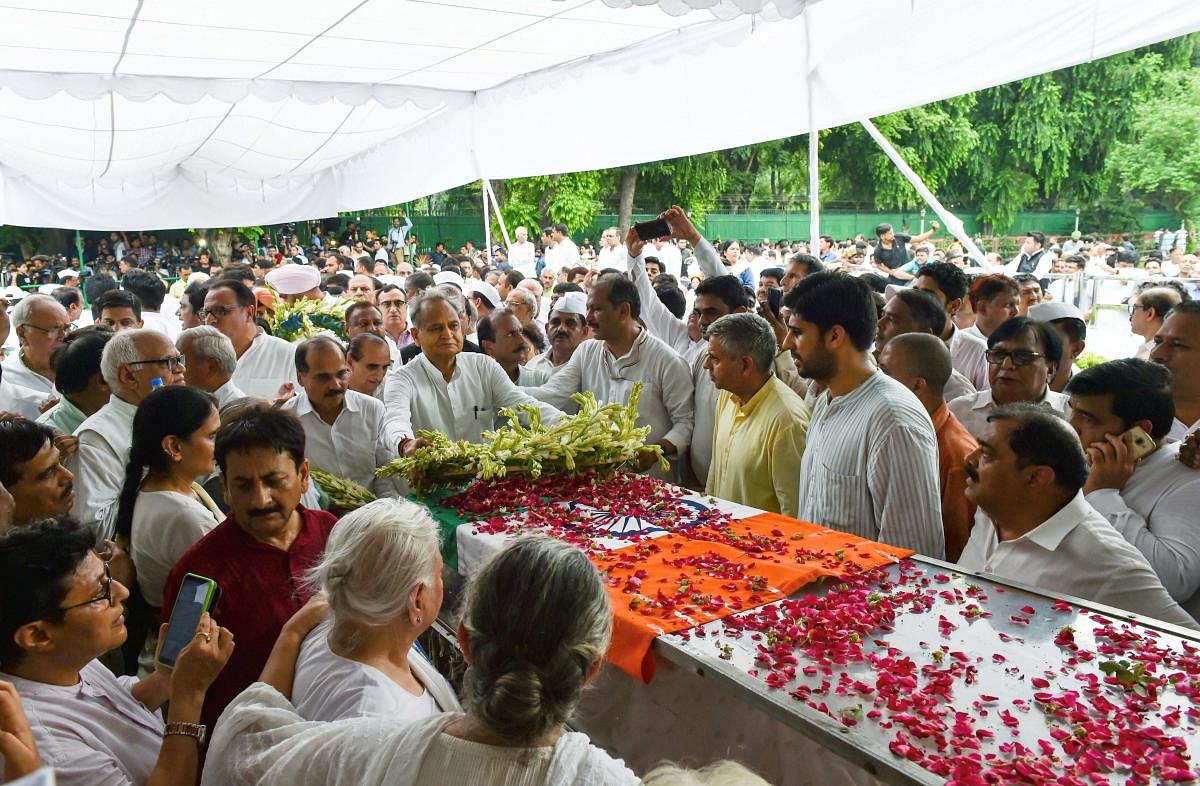Rajasthan Chief Minister Ashok Gehlot pays his tributes to former Delhi chief minister Sheila Dikshit at Congress headquarters, in New Delhi (PTI Photo)