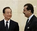 Pakistani Prime Minister Yousuf Raza Gilani, right, speaks with his Chinese counterpart Wen Jiabao during the inauguration ceremony of the Pakistan China Friendship Center in Islamabad. Photo AP