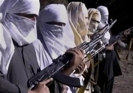 Pakistani Taliban fighters hold weapons as they receive training in Ladda, South Waziristan tribal region, in this still image taken from a video, shot between December 9 to December 14, 2011. Reuters