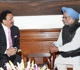Prime Minister Manmohan Singh with Pakistan's Interior Minister Rehman Malik at a meeting in New Delhi on Saturday. PTI Photo