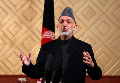 Afghan President Hamid Karzai speaks during a ceremony to mark the 80th anniversary of Kabul University in Kabul May 9, 2013. REUTERS Image