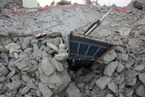 The rubble of a house is seen after it collapsed following the quake in the town of Awaran Reuters Image