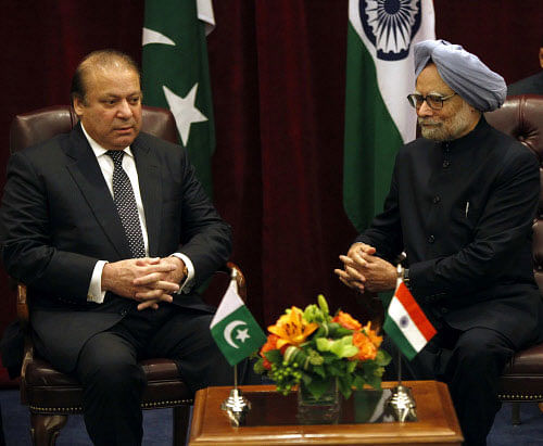 Pakistan's PM Sharif shakes hands with India's PM Singh during the United Nations General Assembly in New York. File Reuters photo