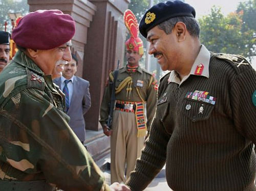 Pakistan Army DGMO Maj Gen Aamer Riaz and Indian Army DGMO Lt Gen Vinodh Bhatia before the delegation level meeting at the Wagah-Attari border on Tuesday - PTI