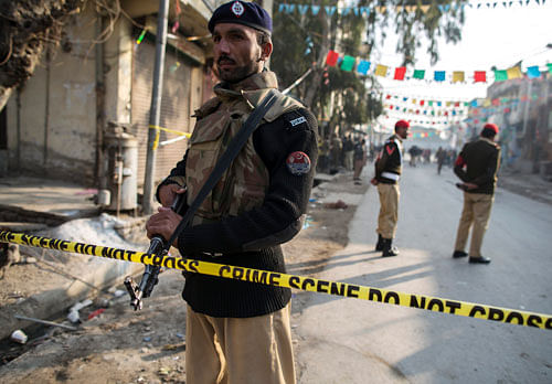 A suicide bomber blew himself up in Pakistan's garrison city of Rawalpindi today, killing four people near the country's military headquarters a day after Taliban suicide bombing inside a cantonment killed 20 troops. Reuters