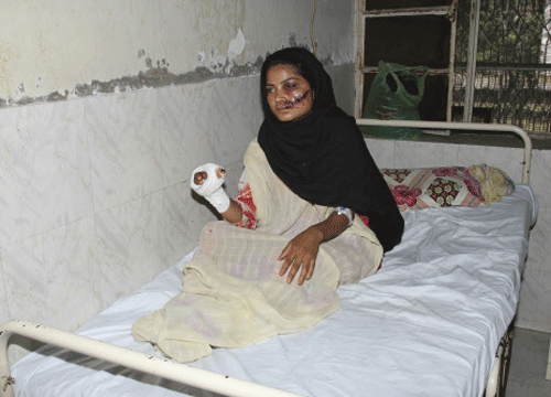 Saba Maqsood, 18, sits on a hospital bed in Hafizabad in Punjab province. Reuters photo