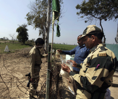 Pakistan Rangers fired at Indian positions overnight on the international border in Samba and Jammu districts, causing no damage, police said Thursday. AP image