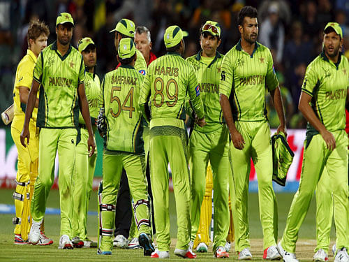 Pakistan players walk off the field following Australia's six wicket win over Pakistan in their Cricket World Cup quarter final match in Adelaide, March 20, 2015. REUTERS