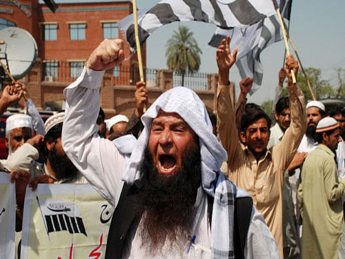 Supporters of Jamaat-ud-Dawa organization chants slogans during anti-India protest in Peshawar. Reuters file photo