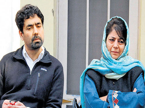 PDP president Mehbooba Mufti with brother Syed Tasaduq Hussain during a party meeting in Jammu. PTI