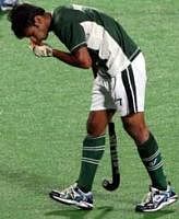 Pakistan player Irfan Muhammad checks his nose after being injured during the Hero Honda FIH World Cup in New Delhi on Thursday. PTI