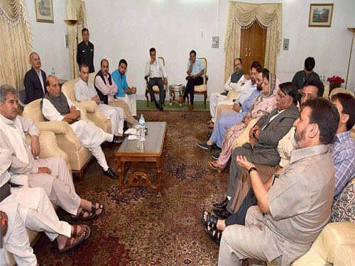 Union Home Minister Rajnath Singh in a meeting with a delegation of J&K Peoples Democratic Party led by General Secretary Mohd. Sartaj Madni in Srinagar on Wednesday. PTI Photo