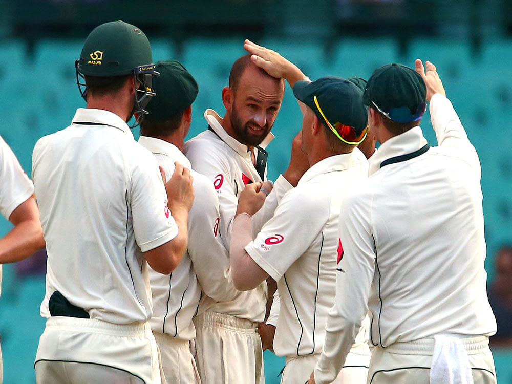 Spinner Nathan Lyon grabbed the wicket of debutant opener Sharjeel Khan for 40, caught at mid-wicket, nearing stumps to have Pakistan at 55 for one. Reuters