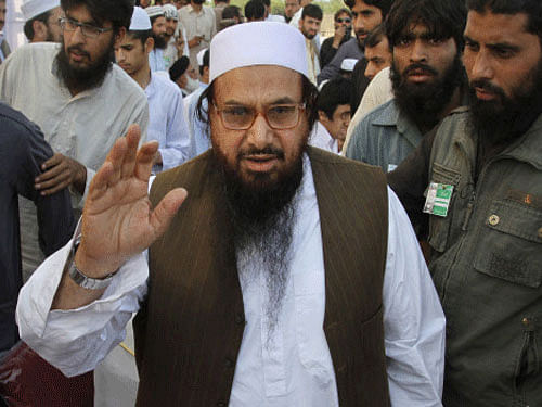 Saeed, who was detained yesterday at his Lahore headquarters, has been shifted to his residence which has been declared as a sub-jail by authorities in Punjab province. Reuters File Photo.