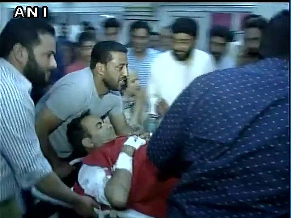 Abdul Qayoom was shot at by militants at least three times from close range outside his home at around 8.10 PM,  a police official said. Image courtesy ANI/Twitter